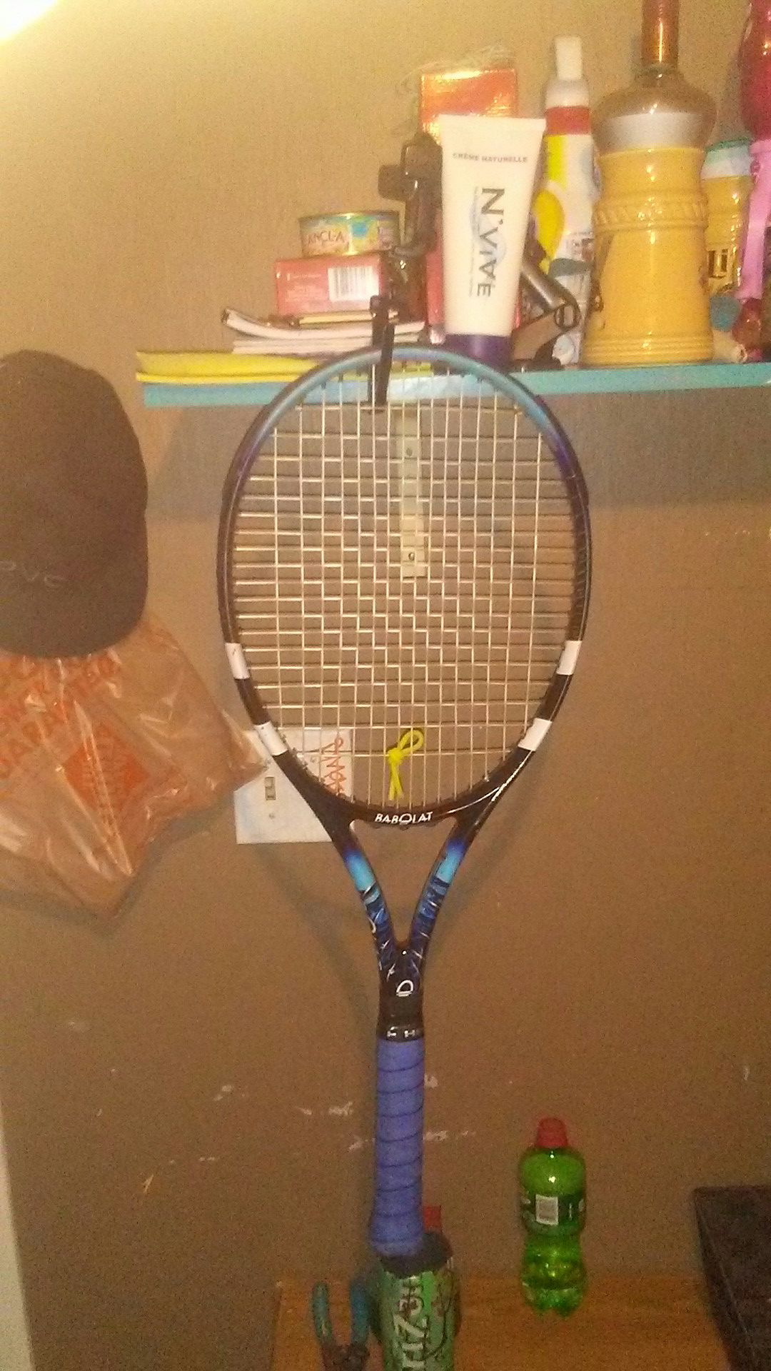 Babolat pure drive tennis racket.