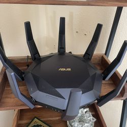 RT-AX89X Router and Nighthawk multi cable modem