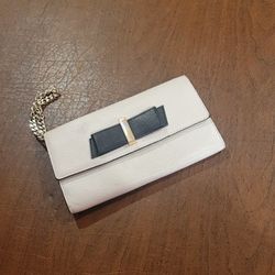 Kate Spade Black Bow OfF Whte Leather Wallet Wristlet. Pre-owned, good 
shape, no rips or cuts
