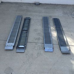 Metal Loading Ramps ... Set of four metal loading ramps, ideal for vehicles or equipment.