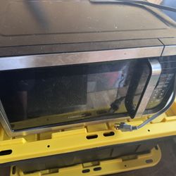 Microwave and Kitchen Utensils