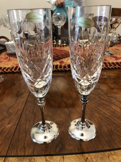 Waterford crystal champagne glasses with silver bottoms
