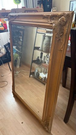Large Ornate gold mirror