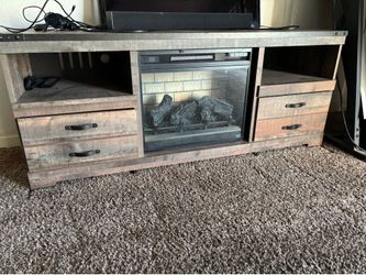 entertainment center with fireplace