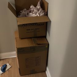 Moving Boxes And Paper Wrap