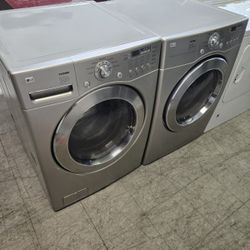 Silver Lg washer and gas dryer
