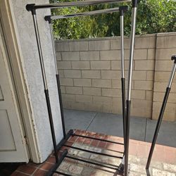 Two Portable Adjustable Clothing Racks