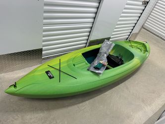 Brand new Kayak with paddle and paddle grips