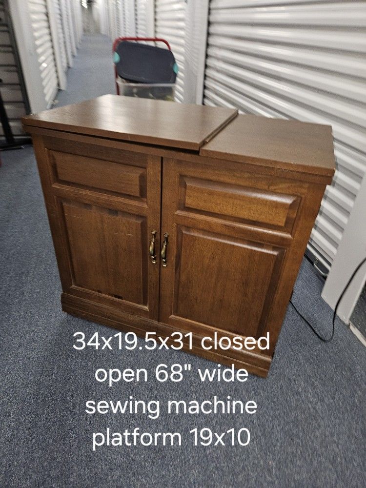 Sewing machine table cabinet with electric sewing machine elevator style platform