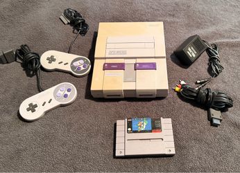 Super Nintendo console controllers and Super Mario world