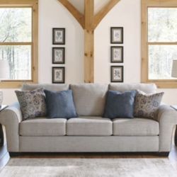 Free Delivery! Lightly used Gray Sofa from Ashley furniture. 102(L) 41(D) 40(H) Fully Clean, From Per Free Home.