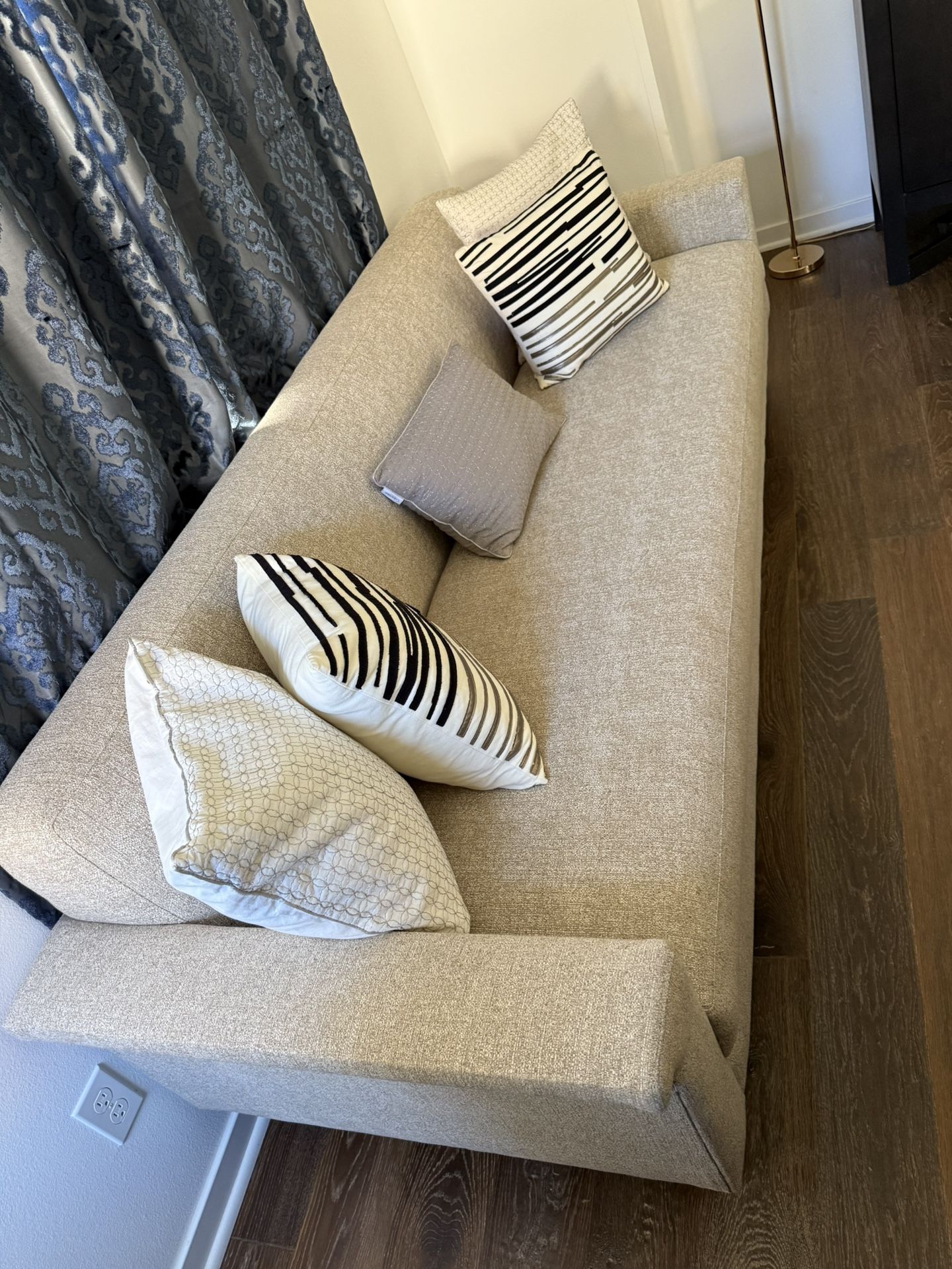 Sofa with Calvin Klein Pillows. 