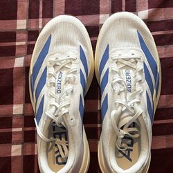 Woman’s Blue and White Adidas Athletic Shoes Size 8