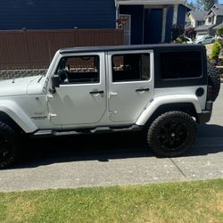 2015 Wrangler Jeep Sierra 83,000 miles in excellent condition just got a $300 detail done on it absolutely beautiful asking 21,000