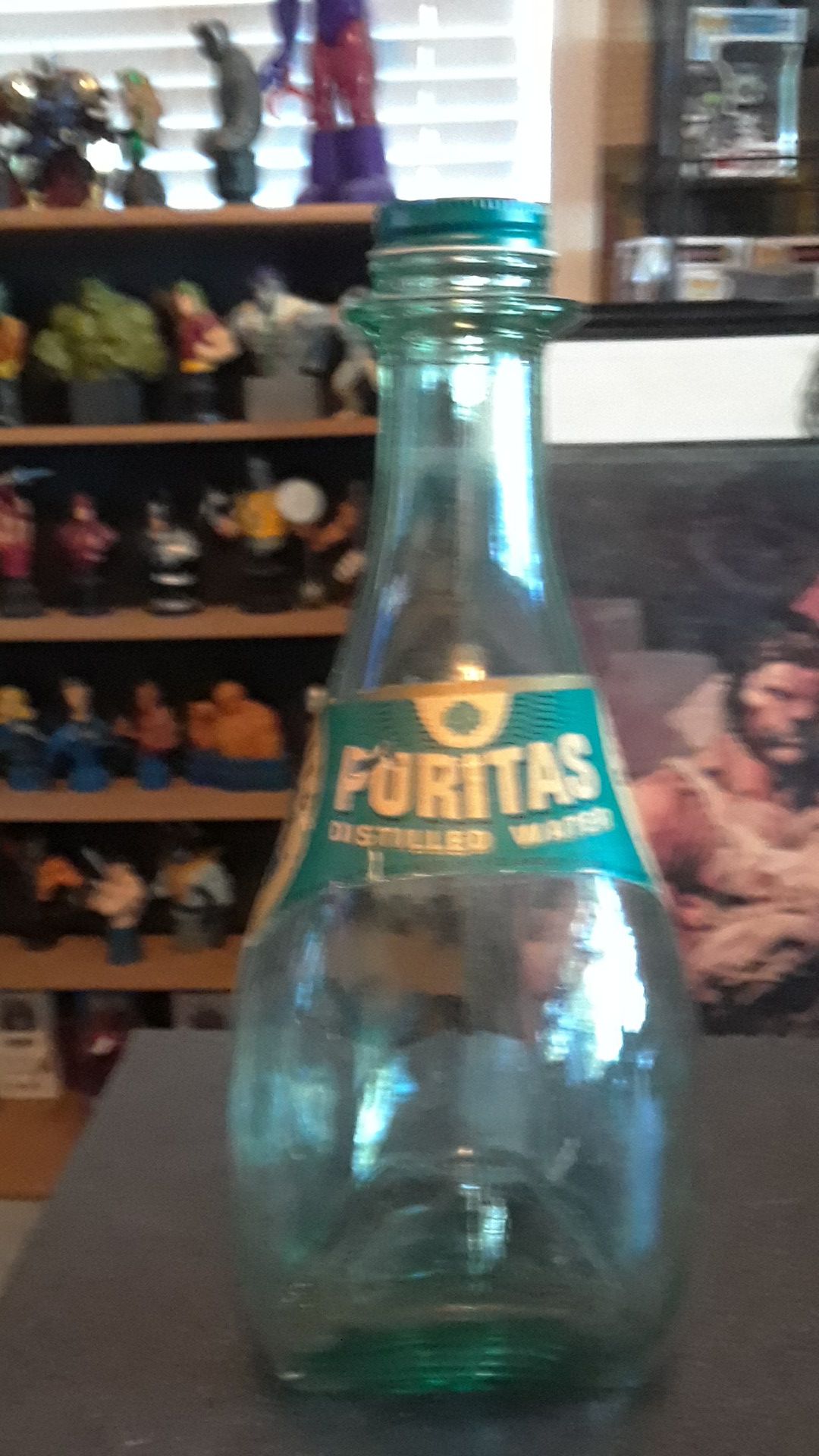 Puritas antique glass water bottle