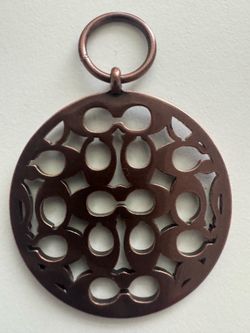 Coach Bronze -Tone Round Cutout Pendant