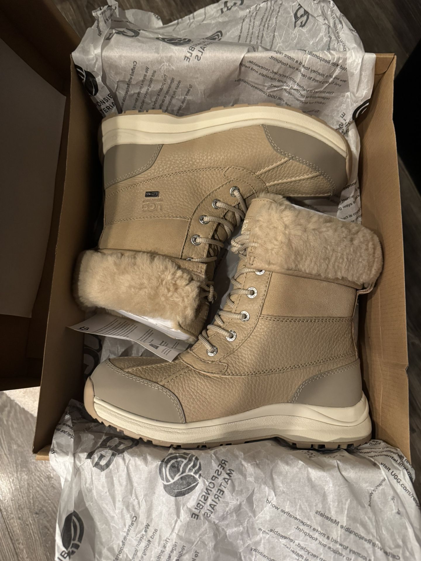 Ugg tan winter fur boots size 8.
