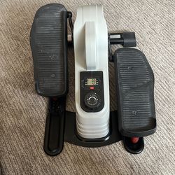 Under desk step machine