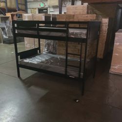 Twin bunk bed. Espresso, grey & white. Assembly required. Assembly not included. Taxes included. Free local delivery.

Bunk bed only with out mattress