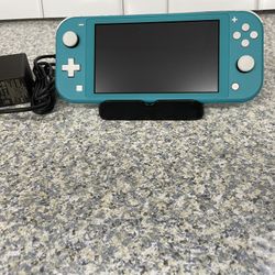 Nintendo Switch Lite 32 gb no offers or trades please!!