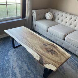 Beautiful wood and metal table in like-new condition.