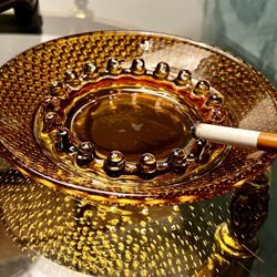 Vintage amber textured glass hobnail ashtray