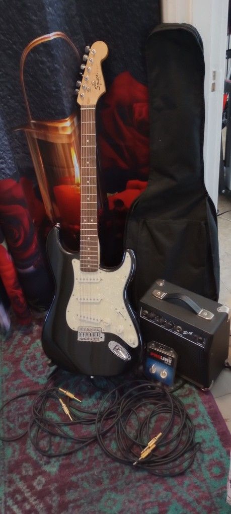 Fender Squier Guitar,  Amp, 2-Cords, Stand, Soft case & Strap Locks 