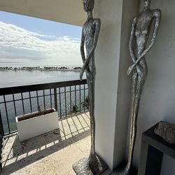 Pair of Modern Abstract Silver Human Statues