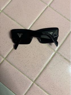 Prada sunglasses $580