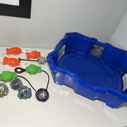 Beystadium w/ 4 Beyblades and 6 Launchers