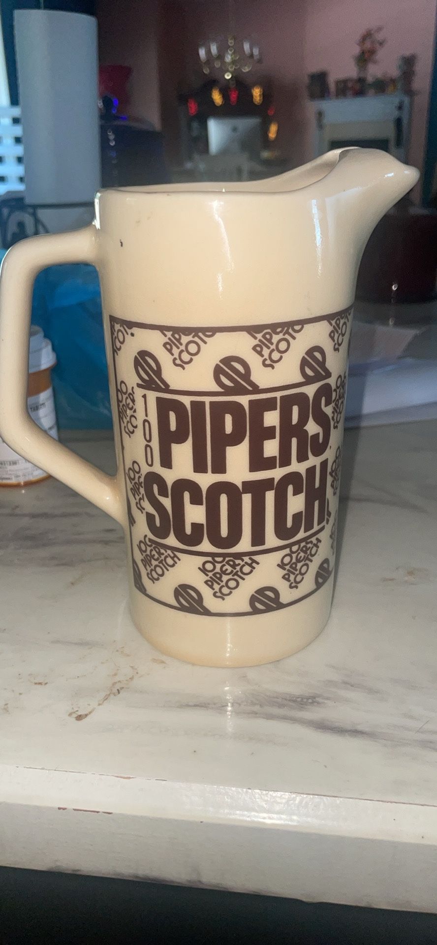 vintage 100 pipers scotch cermqic pitcher