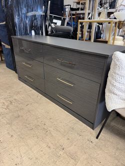 modern six-drawer dresser in a dark grey wood-grain finish, accented with sleek slim metallic pull handles w/ 2 night stands  - Retail: $1595