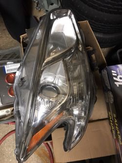 Nissan Maxima right headlight