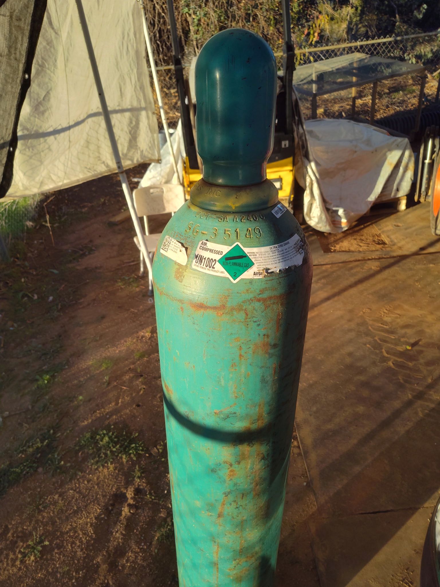 Compressed gas cylinder.