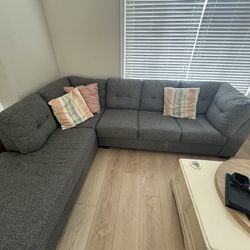 Grey sectional couch With Pull Out Bed