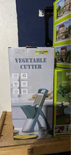 Vegetable Cutter with Folding Storage