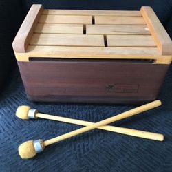 Gato brand wood tong drum.