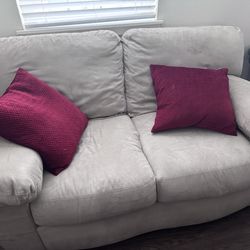 Cream micro fiber couch, love seat, ottoman and chair