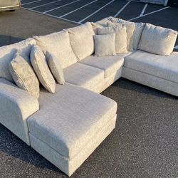 FREE DELIVERY AND INSTALLATION - Megginson 2-Piece Sectional with Double Chaise (Look Our Profile)