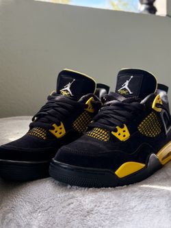 Yellow Thunders Jordan 4s