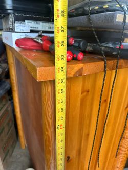Wooden dresser.  Very solid, very heavy, real wood throughout