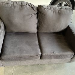 Ashley Furniture 2 seater black couch
