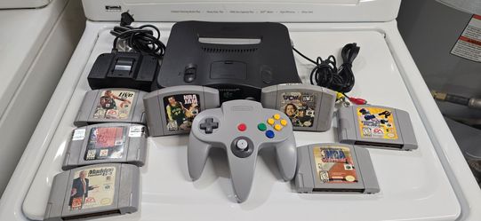 Nintendo 64 complete with games price is firm