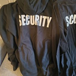 Black sweater with hoodie with SECURITY on the back .And Black long sleeve shirt with SECURITY on the back.