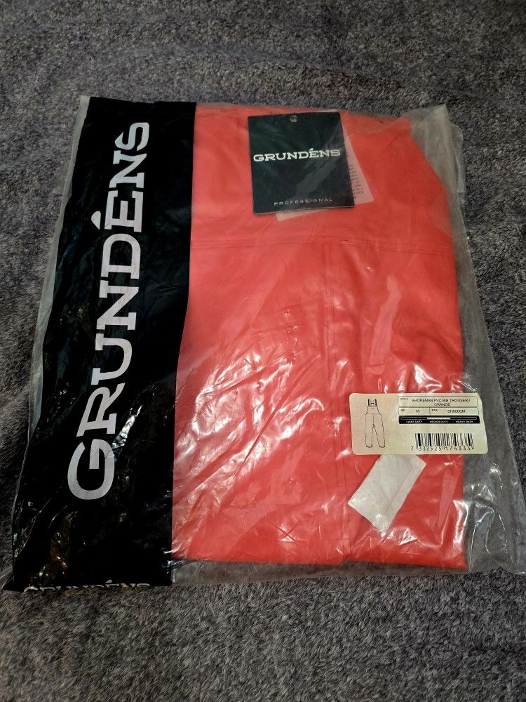 Grundin's.
Shoreman p v c bib trouser orange, medium