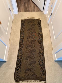 Pashmina brand scarf/shawl features a dark brown floral jacquard pattern