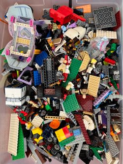 30lbs of LEGOS (includes mini figures and floors)