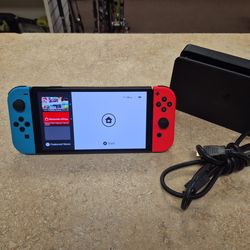 Nintendo Switch OLED Console Red Blue Joycons