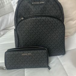 A Large Michael Kors, Black And Gray With Silver Hardware, Backpack And Wristlet Wallet Set