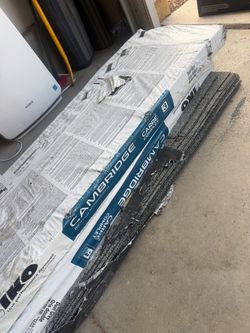 3 Bundles of Gray Shingles with half box of nails